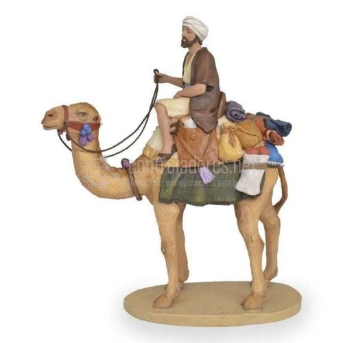 Pastor a camello con carga